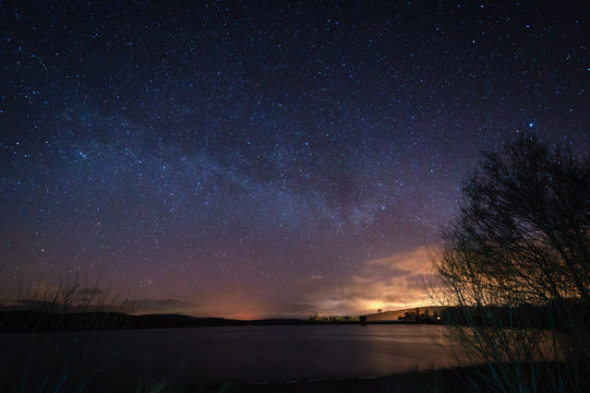 Milky Way above Fontburn Reservoir / Fontburn Reservoir in Northumberland is a popular place for fishing and walking, seen her under the stars at night