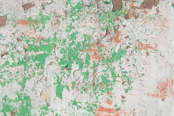 Fotobehang Verweerde muur oppervlak van roestig ijzer met overblijfselen van oude verf, textuurachtergrond