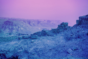 Beautiful sunrise over Masada fortress. Ruins of King Herod's palace in Judaean Desert.