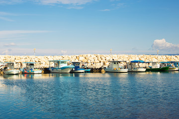 Fototapeta na wymiar Yachts and boat in the port