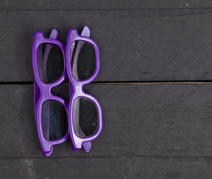 Two 3d glasses on wooden background