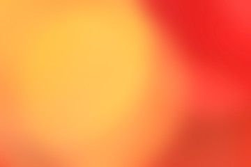 Blurred vibrant yellow anf orange color abstract background