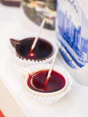 Ginja de Obidos, traditional sour cherry liquor, served in small cups made of chocolate
