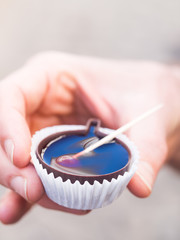 Ginja de Obidos, traditional sour cherry liquor, served in small cups made of chocolate