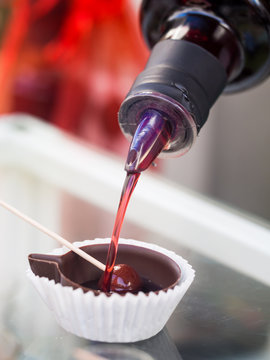 Ginja de Obidos, traditional sour cherry liquor, served in small cups made of chocolate
