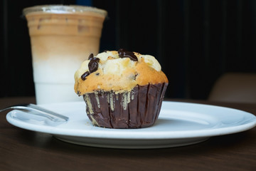 chocolate muffin on white plate
