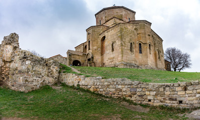 View indoors and outdoors of Jvari Monastery is a sixth century Georgian Orthodox monastery near Mtskheta, eastern Georgia.It is listed as a World Heritage site by UNESCO. Spring in Georgia.