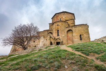 Fototapeta na wymiar View indoors and outdoors of Jvari Monastery is a sixth century Georgian Orthodox monastery near Mtskheta, eastern Georgia.It is listed as a World Heritage site by UNESCO. Spring in Georgia.