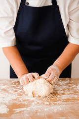 Chef preparing dough - cooking process
