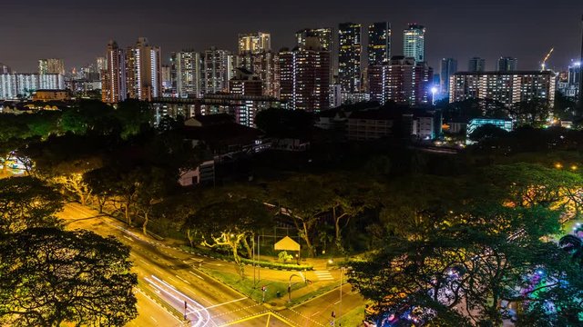 View of the Downtown Singapore skyline, night scene time lapse with traffic and car trails