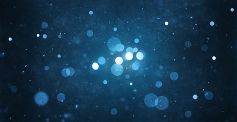 abstract particle bokeh with dark blue background