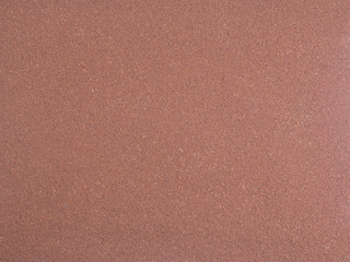 Brown background from roasted and grinded coffee. Captured from top view