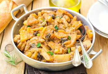 Russian pork stew with potatoes and mushrooms