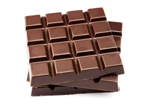 Bitter, dark chocolate bar, isolated on white background, close-up view