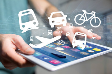 Concept of checking different way to go on holidays on a device - Travel concept