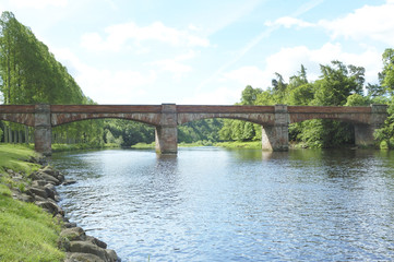 Fototapeta na wymiar Mertoun old bridge over salmon beat on river Tweed