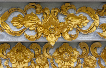Traditional Thai style art on temple's wall, Thailand, Thailand stucco relief golden.