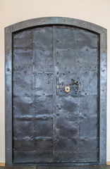 Vintage iron door with a lock