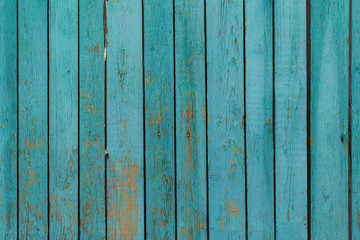 Fototapeta na wymiar Old beautiful wooden fence in the village