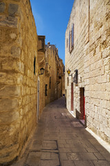 The narrow street of Mdina, the old capital of Malta.