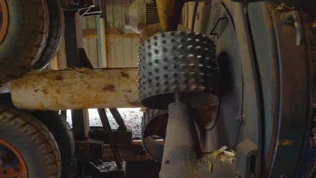 13436_Closer_look_of_the_debarking_process_in_the_sawmill.mov