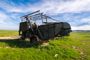 Fototapeta premium Old farming machinery in Carrizo Plain National Monument, San Andreas Fault (boundary between the Pacific Plate and the North American Plate), California USA, North America