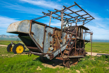 Fototapeta na wymiar Old farming machinery in Carrizo Plain National Monument, San Andreas Fault (boundary between the Pacific Plate and the North American Plate), California USA, North America