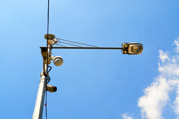 Loudspeaker and CCTV camera on lamp post