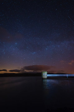 Stars above Fontburn Reservoir / Fontburn Reservoir in Northumberland is a popular place for fishing and walking, seen her under the stars at night