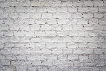 white brick wall background and texture with dark vignette