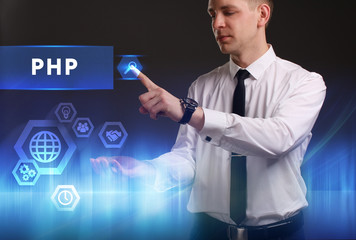 Business, Technology, Internet and network concept. Young businessman working on a virtual screen of the future and sees the inscription: PHP