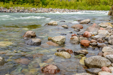 Fototapeta na wymiar Majestic mountain river in Canada. Long exposure water.