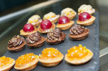 small platter of fancy mini cakes