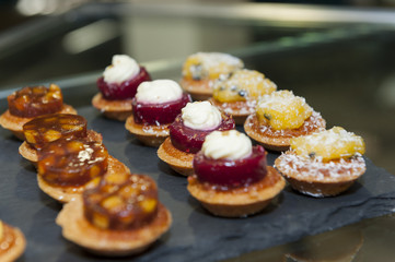 small platter of fancy mini cakes