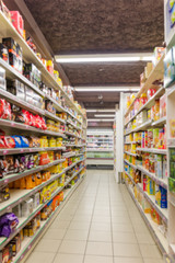 Blurred abstract background of shelf in supermarket
