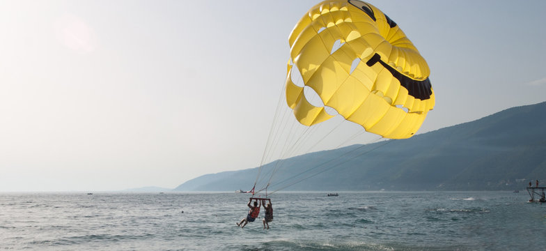 Parasailing in a blue sky