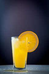 Orange juice and slices of orange fruit