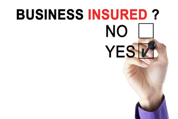 Hand of entrepreneur approving business insured
