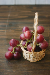 Basket filled with red grapes
