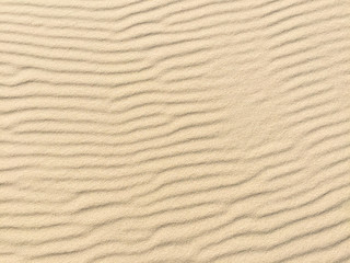Beach sand - beach sand with waves of the blow of the wind