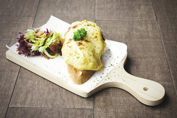 Mozzarella cheese bun on wooden table