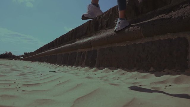 Girl Jumping Into Sand, Impact Cover Camera Lens