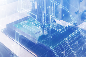 The concept of future technologies. Computer board with visual effects in a futuristic style. Automation of machine assembly of computer circuit board. The process of soldering the board. 