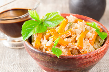 Cooked rice and steamed carrots close-up