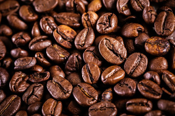roasted coffee beans background. brown texture