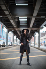A portrait of a young, fashionable, african american woman in the streets of Brooklyn, New York City. Shot during the spring of 2017.