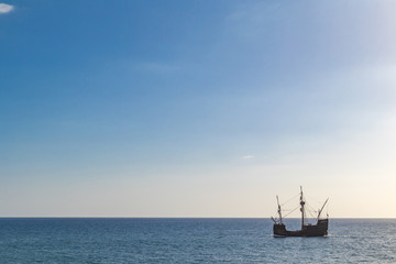 Old Wooden boat in the sea