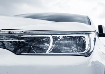 White car headlights.