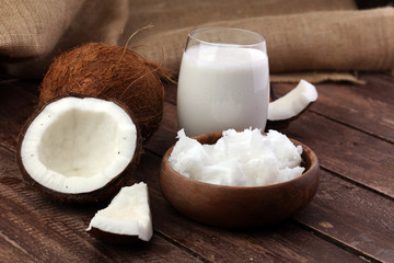 Coconut vegan milk non dairy in bottle and coconut oil
