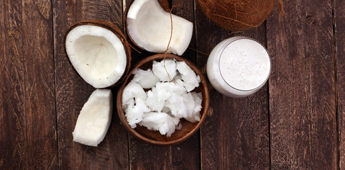 Coconut vegan milk non dairy in bottle and coconut oil